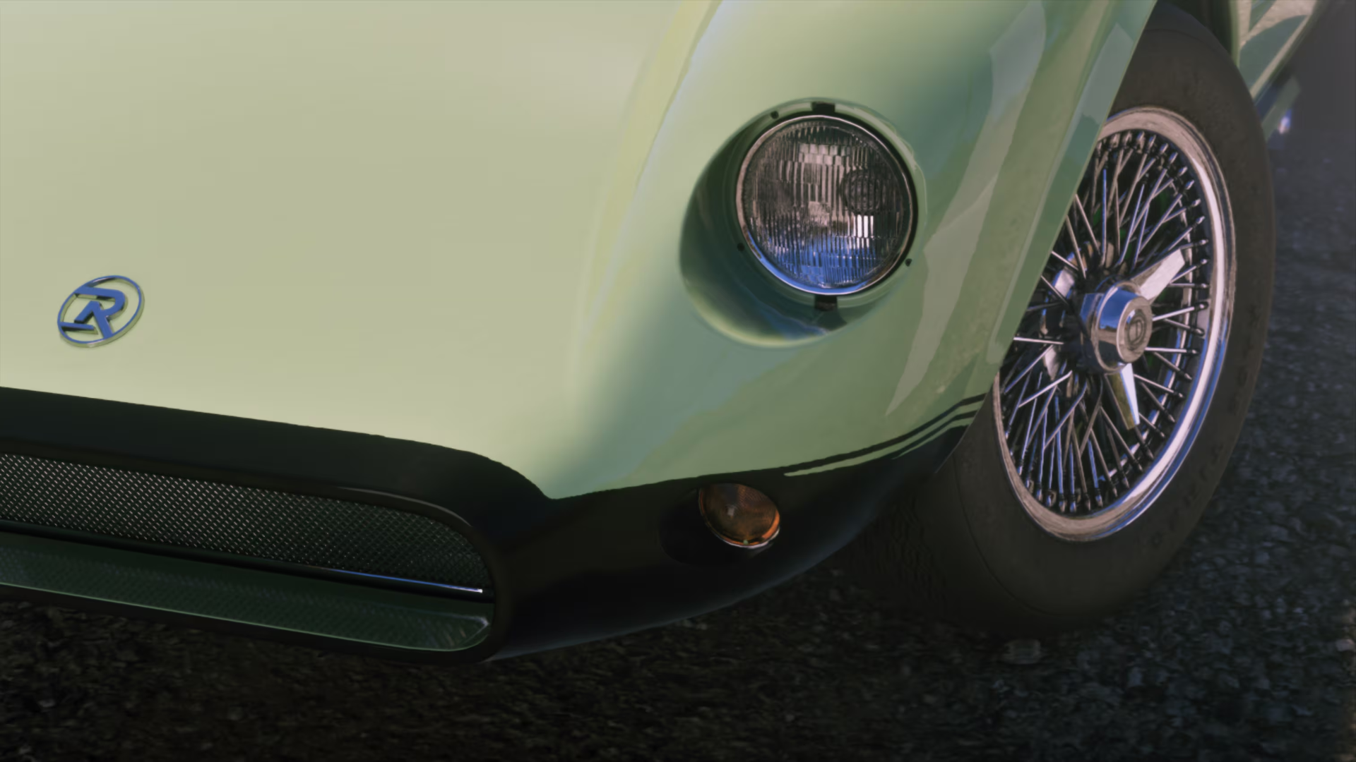 Gros plan sur la calandre et la roue d'un roadster classique
